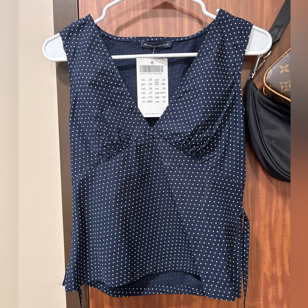 Brandy Melville navy blue polka dot shirt
